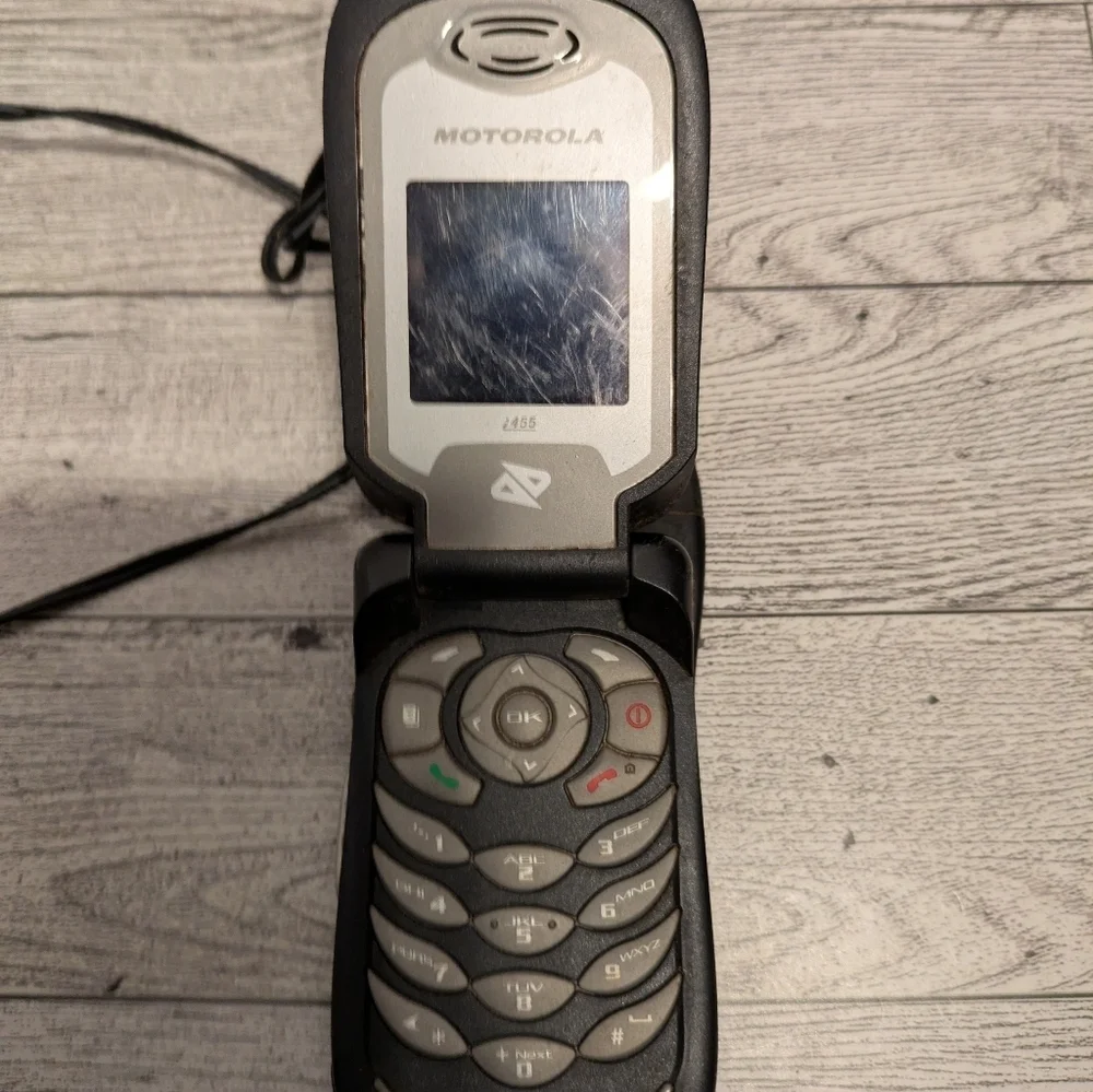 Motorola Black and Gray Flip Phone with Charger